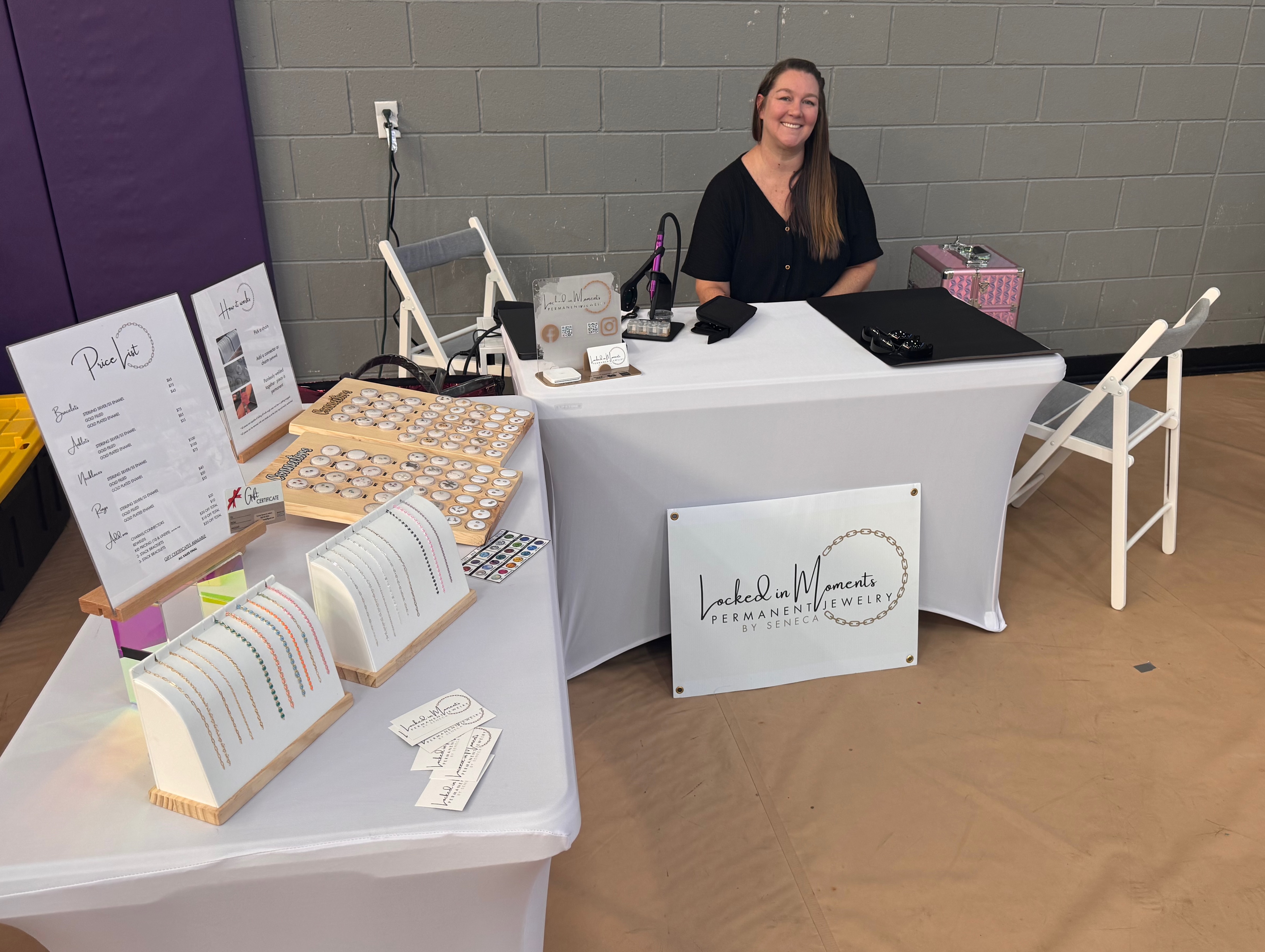 Seneca in her booth at a Christmas market